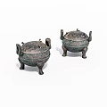 Ancient Bronze Vessels With Three Legs Double Handles And Decorative Patterns