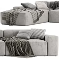 Neutral Gray Sectional Sofa With Cozy Blankets And Decorative Pillows 3d model