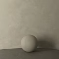 White Sphere Component On Gray Surface With Light Textured Wall Background