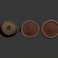 Three Burlap Sacks With Red Grains Food In Different Sizes On Dark Surface
