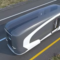 Futuristic Bus With Sleek Aerodynamic Design Moving On Highway Road