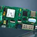 Detailed View Of Green Circuit Board With Electronic Chips And Connectors