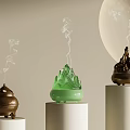 Decorative Ornament Set With Green And Brown Incense Burners On White Cylindrical Stands And Smoke