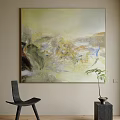 Abstract Oil Painting on Beige Wall with Black Chair and Potted Plant