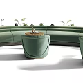 Modern Curved Green Public Chairs With Small Tables And Plants In Outdoor Area