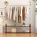 Modern Clothes Rack with Hanging Neutral Tones Apparel Stacked Clothes Handbags and Shoes