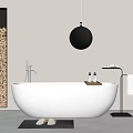 White Freestanding Bathtub with Black Globe Light Wood Column and Bath Products in Modern Bathroom
