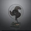Classic Tabletop Electric Fan With Metal Grill And Control Buttons On Base