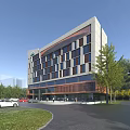 Modern Office Building with Solar Panels Surrounded by Greenery Parking Lot and Trees Near Road