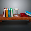 Wooden Tabletop Shelf Display with Colorful Books Hourglass and Red Box