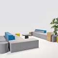Modern Modular Public Seating in Grey Blue Yellow With Round Side Tables and Green Plant