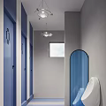 Public Restroom with Gray Walls Round Mirrors Blue Handrails and White Fixtures