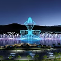 Dazzling Nighttime Scenery With Illuminated Fountains Mountains And Calm Reflective Water