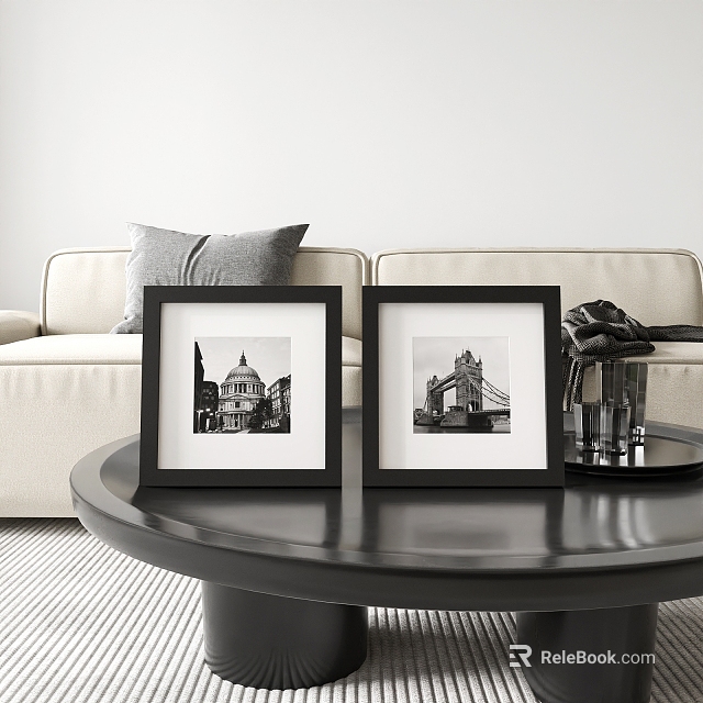 Black Picture Frames With Architectural Photos On Round Coffee Table In Living Room 3d model 