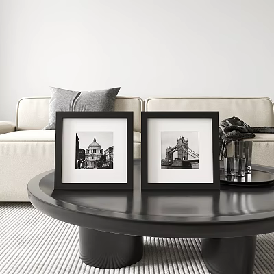 Black Picture Frames With Architectural Photos On Round Coffee Table In Living Room 3d model
