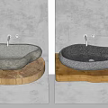 Natural Stone Washbasin with Modern Faucet on Wooden Base and Concrete Wall