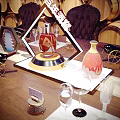 Elegant Wine Cellar Interior With Wooden Barrels Long Table And Wine Glasses