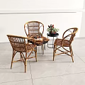 Wicker Leisure Chairs With Small Round Table In Indoor Relaxation Space