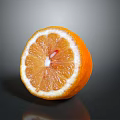 Fresh Red Blood Orange Cut Open Showing Juicy Pulp And Bright Color