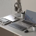 Modern Laptop Workspace Setup With Tablet Keyboard Mouse Headphones Pens And Coffee Cup