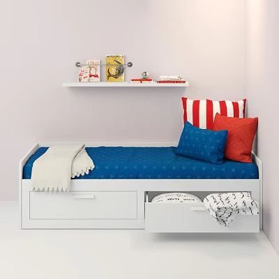Single Bed With Blue Sheet Red And Blue Pillows Underbed Drawers Wall Shelf And Books 3d model