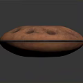 Copper Colored Circular Aerospace Object With Lunar Surface Like Holes For Space Exploration