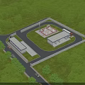 Industrial Factory Facility With Modern Warehouse Building Surrounded by Green Trees and Access Road