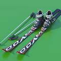 Complete Sports Equipment Including Skis Ski Boots and Ski Poles on Green Background