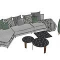 Modern Beige L Sofa With Plaid Throw And Patterned Cushions Round Marble Coffee Table Set 3d model