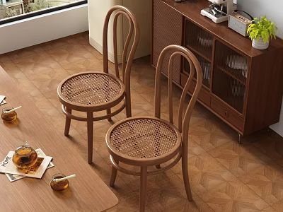 Natural Wooden Dining Chairs With Curved Backrest And Rattan Seat In Cozy Dining Area 3d model
