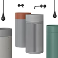 Modern Cylindrical Washbasins In Different Colors Featuring Textured And Smooth Concrete Surfaces