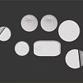 Multiple Silver Reflective Metal Cans for Food Storage in Various Shapes on Black Background