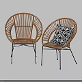 Natural Wicker Leisure Chairs With Black Metal Legs And Geometric Pattern Cushion
