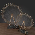 Golden Ferris Wheel Design Decorative Ornament Set With Black Marble Base On Wooden Tabletop
