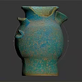 Antique Turquoise Ceramic Jug With Handles Spout And Speckled Texture On Dark Background