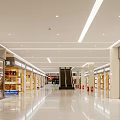 Spacious Bright Shopping Mall Lobby With Shops on Both Sides Central Staircase and Shiny Floor
