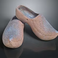 Traditional Handcrafted Wooden Clogs With Intricate Carved Patterns And Classic Design