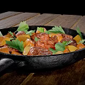 Savory Meat Chunks Sausages and Carrots in Cast Iron Skillet with Parsley on Wooden Table