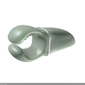 Light Green Handheld Massager With Small Bumps And Ergonomic Design For Care