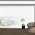 White Blinds Covering Window in Bright Interior with Wooden Floor Brown Chair and Plant Vase