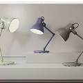 Modern Adjustable Arm Desk Lamps in Green Blue Gray on White Surface