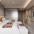 Modern Hotel Room With Double Beds Desk And Orange Chair