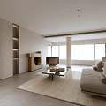 Minimalist Living Dining Room with Beige Sofa Coffee Table Fireplace Large Windows and Natural Light