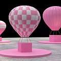 Pink Hot Air Balloon Photo Check in Spot Featuring Checkered Pattern and Round Platforms