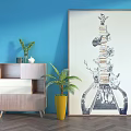 Wooden Console Table with Green Plants and Decorative Painting Against Blue Wall