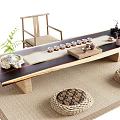 Traditional Wooden Tea Table and Woven Stools with Tea Set Green Plant and Mat
