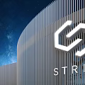Modern STRIM Building Exterior With Hexagonal Logo And Illuminated Striped Curved Facade