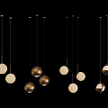 Stylish Pendant Lights with Various Designs Gold and White Spherical Shades Against Black Background
