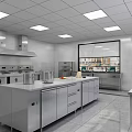 Commercial Kitchen Interior With Stainless Steel Countertops Cabinets And Recessed Lighting