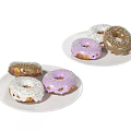 Colorful Donuts With Various Frostings And Sprinkles On White Plates